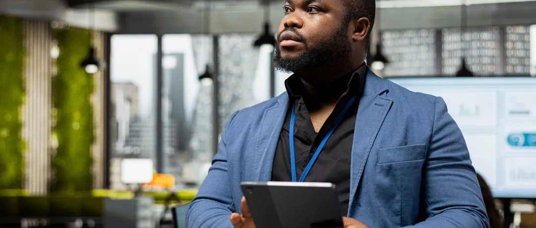 businessman overseeing analytics tasks